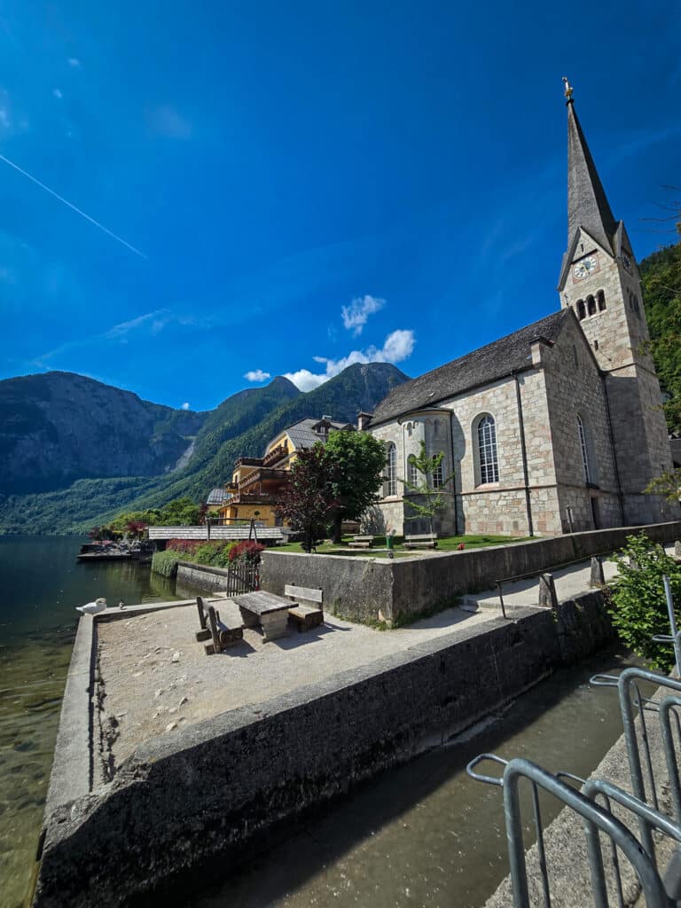 Direct view of Lake Hallstatt next to the church