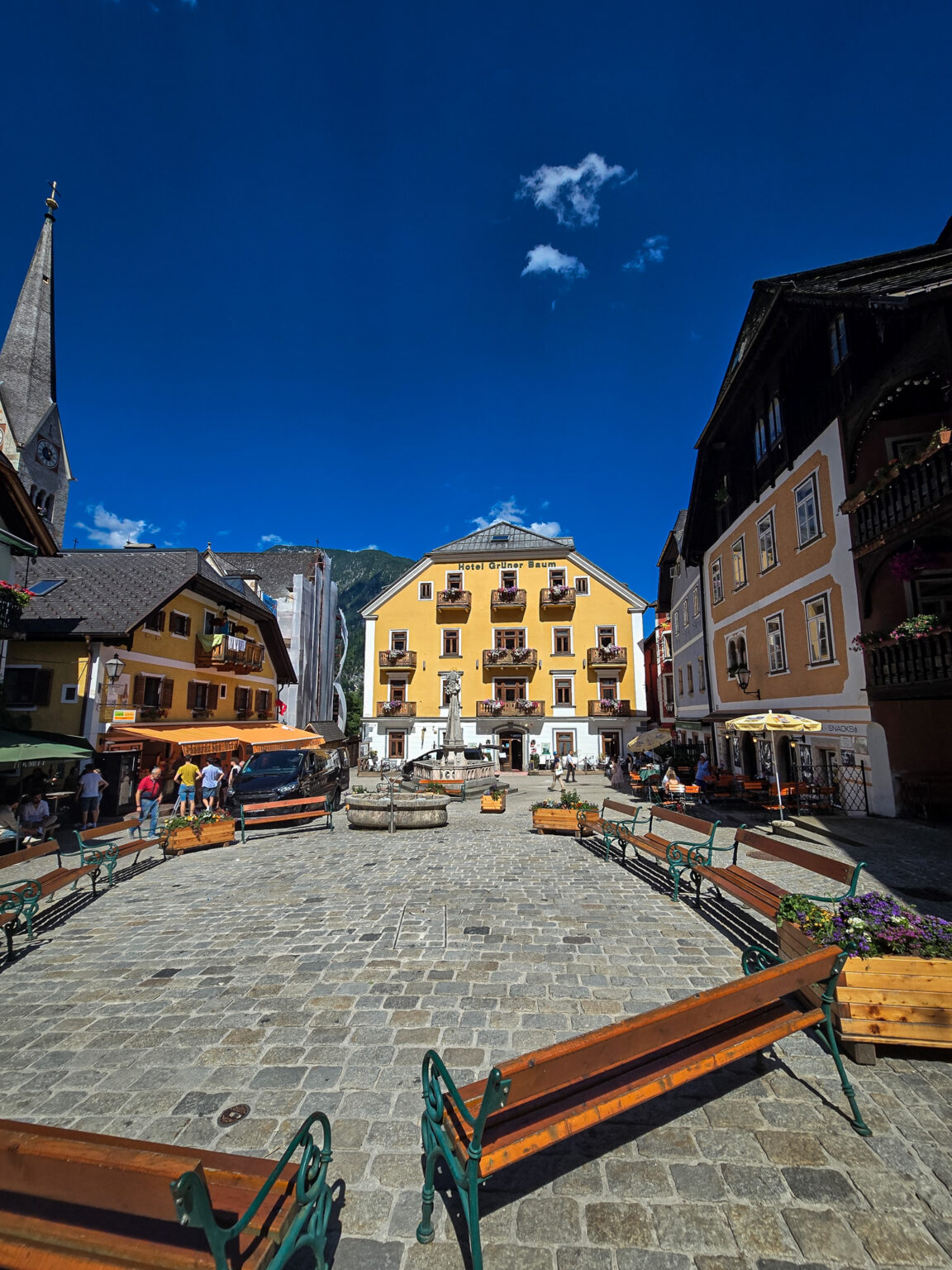The large Hallstatt market square with restaurants and cafés